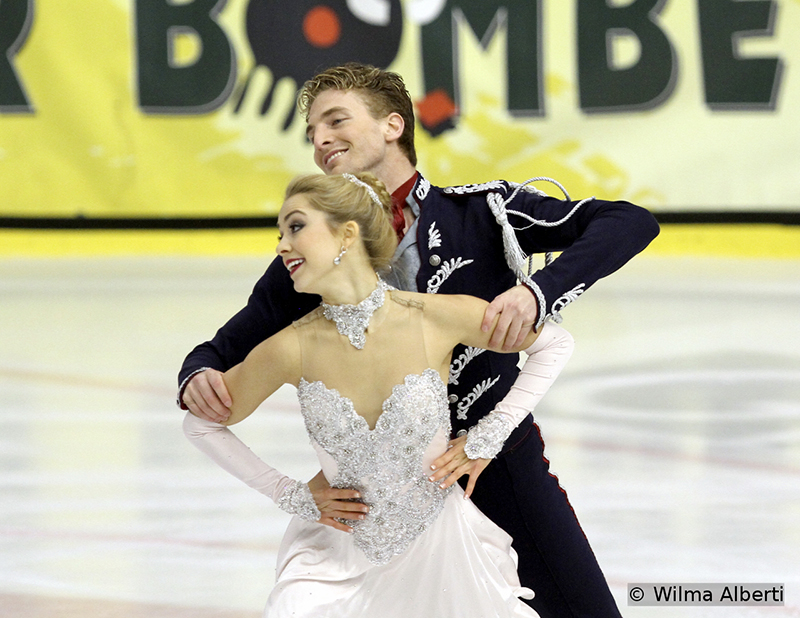This new ice dancing couple, America’s Danielle Thomas and Daniel Eaton, chose to skate to selections from “Cinderella” in the Short Dance – and won this particular segment of the event in Graz (Daniel formerly skated with Alexandra Aldridge)