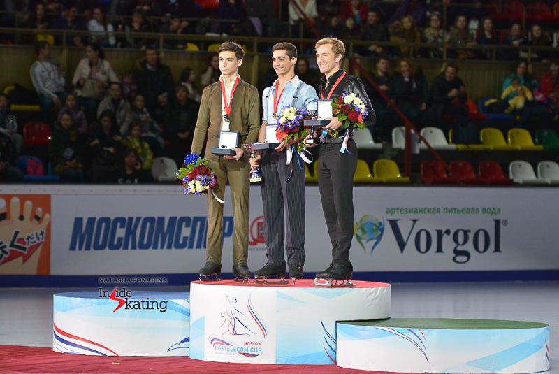 The podium in the men's event at 2015 Rostelecom Cup; from left to right: Adian Pitkeev (silver), Javier Fernández (gold), Ross Miner (bronze)