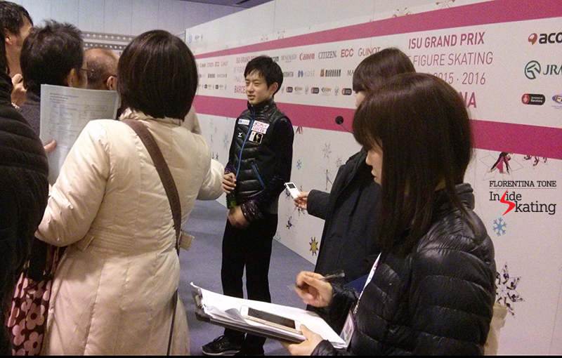 Japan's Stota Yamamoto surrounded by journalists in the Mixed zone