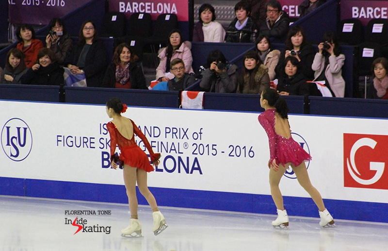 Japan's Satoko Miyahara and Mao Asada during warm-up before SP at 2015 Grand Prix Final in Barcelona