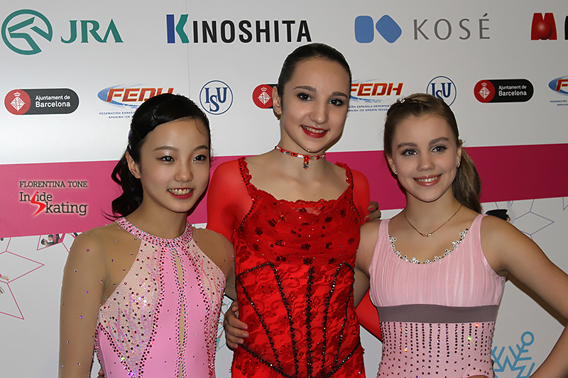 Top 3 ladies after the short program, posing for the photographers in the mixed zone: Marin Honda (third), Polina Tsurkaya (first), Alisa Fedichkina (second)