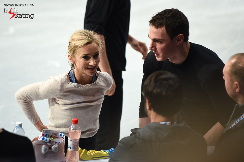 The highlight of group 3 of practice is, of course, this pair: Aliona Savchenko and Bruno Massot; here you have them at the boards, talking to their coaches, Alexander König and Jean-Francois Ballester.